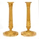 Et par lueforgyldte Empire bronze stager. Frankrig ca. år 1810. H: 28cm